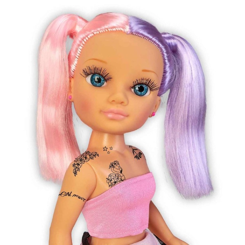 NANCY CADA DIA UN TATTOO